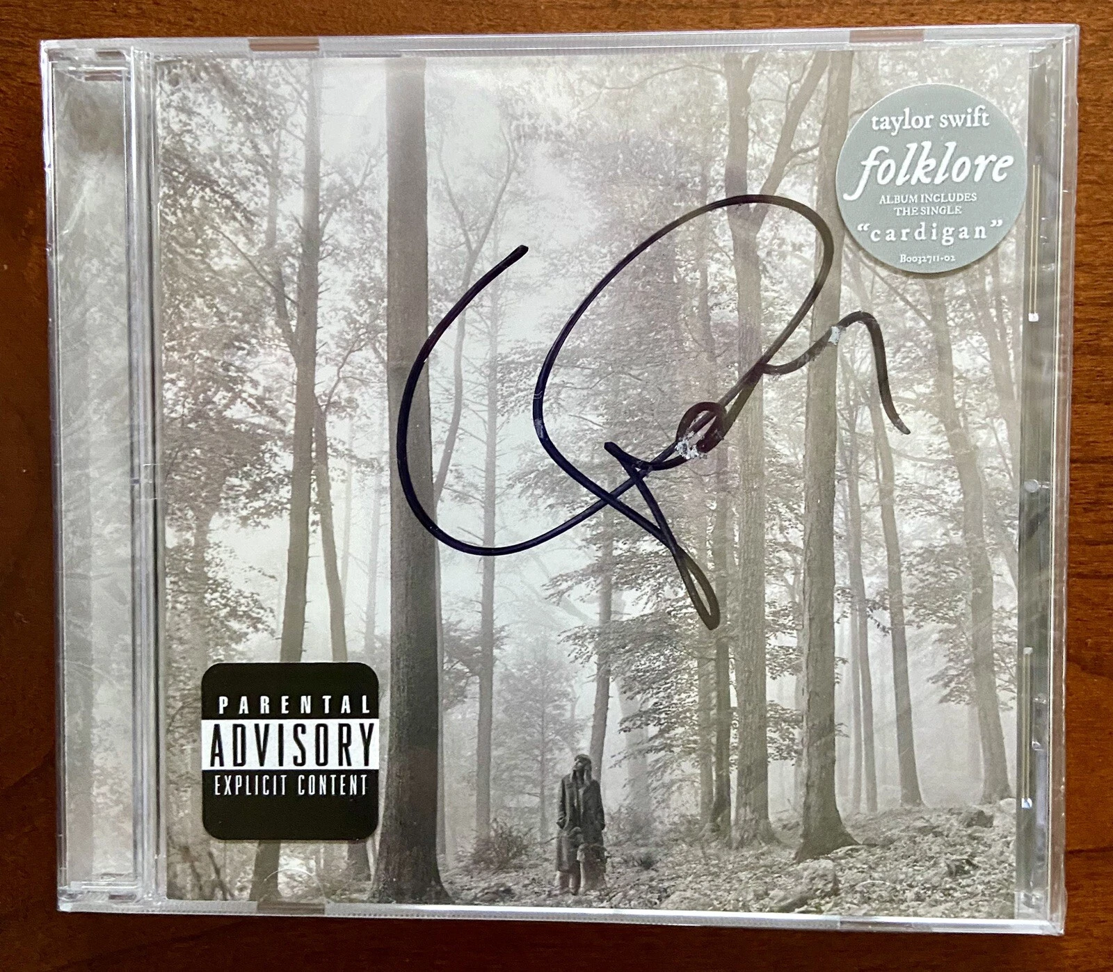 Taylor Swift Signed “Folklore” CD Booklet